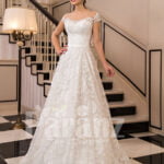 All-over lace work beautiful floor length white tulle wedding gown with royal bodice