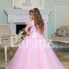 Beautiful floor length light pink baby gown with floral appliquéd bodice and tulle skirt back side view