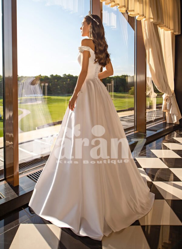 Beautiful metal white off-shoulder tulle underneath Cinderella wedding gown back side view