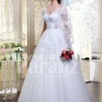 Beautiful milk white flared tulle skirt wedding gown with royal thread appliquéd bodice