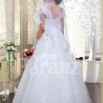 Beautiful milk white flared tulle skirt wedding gown with royal thread appliquéd bodice back side view