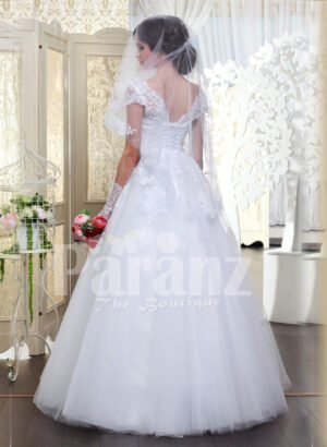 Beautiful milk white flared tulle skirt wedding gown with royal thread appliquéd bodice back side view