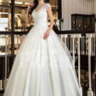 Beautiful rich white satin gown with high volume tulle underneath skirt and rich bodice