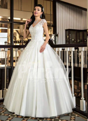 Beautiful rich white satin gown with high volume tulle underneath skirt and rich bodice