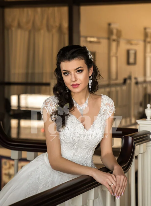 Beautiful rich white satin gown with high volume tulle underneath skirt & rich bodice