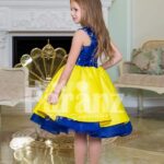 Bright blue-yellow tea length tulle skirt sleeveless satin party dress for girls back side view