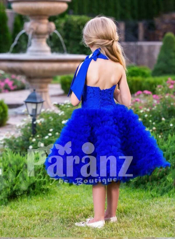 Bright royal blue close neck baby party dress with soft cloud tea length skirt back side view