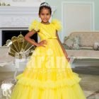 Bright yellow floor length ruffle-tulle elegant party gown for girls
