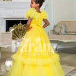 Bright yellow floor length ruffle-tulle elegant party gown for girls back side view