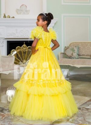 Bright yellow floor length ruffle-tulle elegant party gown for girls back side view