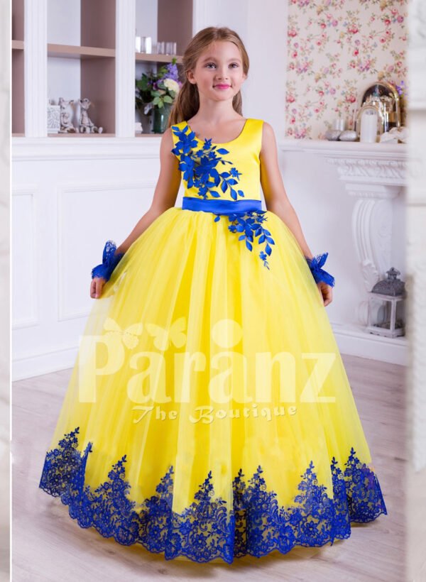 Bright yellow sleeveless floor length tulle skirt party gown with royal blue lace works