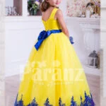 Bright yellow sleeveless floor length tulle skirt party gown with royal blue lace works back side view