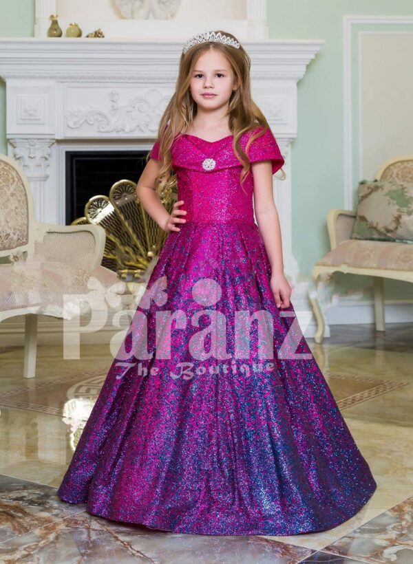 Elegant magenta pink floor length baby gown with all over blue glitz and royal bodice
