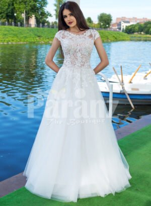 Elegant pearl white floor length flared tulle skirt wedding gown with lacy bodice