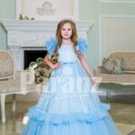Elegant sky blue floor length baby gown with ruffle sleeve and long tulle-ruffle skirt