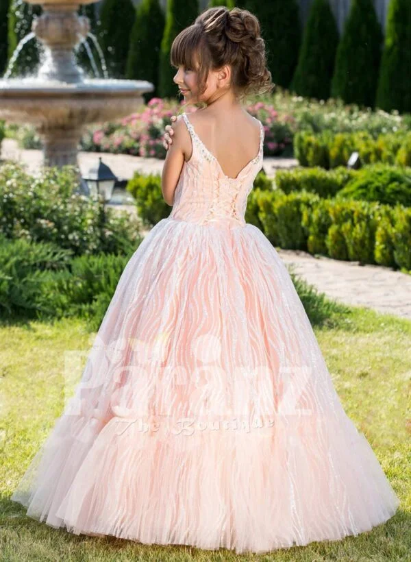 Elegant sleeveless peach hue floor length baby party gown with glitz sequin work all over side view