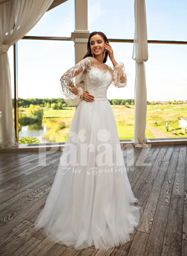 Elegant white soft tulle skirt wedding gown with full sleeve royal bodice