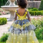 Elegant yellow-grey floor length flared tulle skirt baby gown with amazing floral works back side view