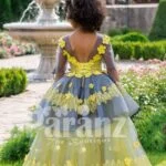 Elegant yellow-grey floor length flared tulle skirt baby gown with amazing floral works back side view