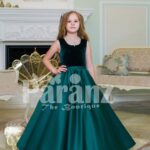 Exclusive deep green velvet bodice baby gown with rich satin bottle green floor length skirt