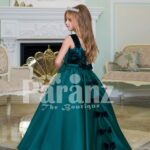 Exclusive deep green velvet bodice baby gown with rich satin bottle green floor length skirt side view
