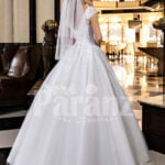 Exclusive pearl white real tulle skirt wedding gown with royal lacy bodice back side view