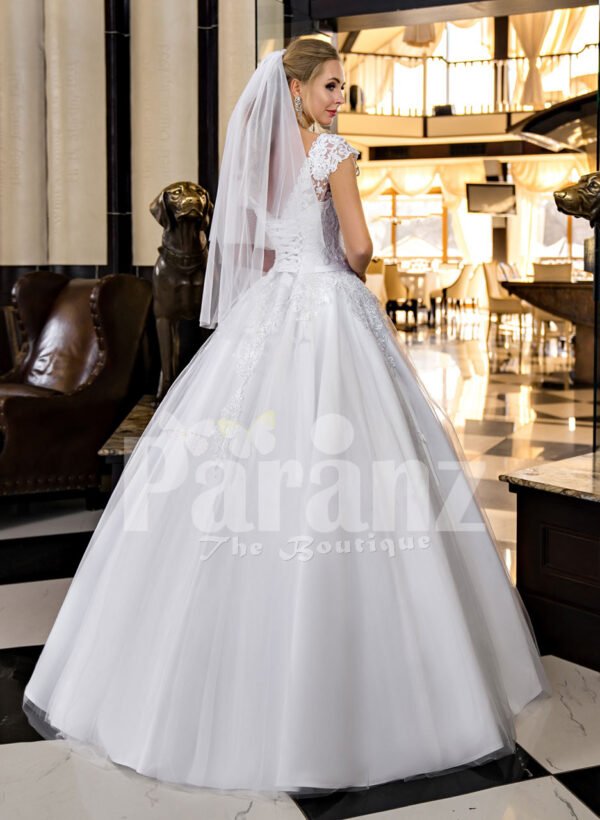 Exclusive pearl white real tulle skirt wedding gown with royal lacy bodice back side view