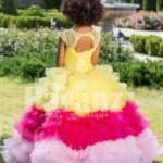 Floor length flared and high volume ruffle-tulle skirt dress for girls with floral bodice back side view