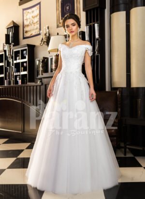 Floor length pearl white off-shoulder satin gown with high volume tulle skirt