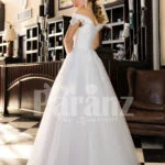 Floor length pearl white off-shoulder satin gown with high volume tulle skirt back side view