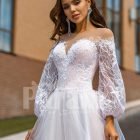 Floor length stunning white off-shoulder Arabian princess style wedding tulle gown close view