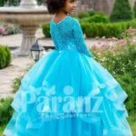 Full sleeve sky blue rich satin-sheer bodice baby party gown with multi-layer flared tulle skirt side view