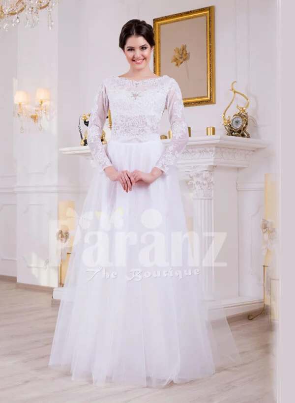 Full sleeve super stylish pearl white floor length wedding gown with tulle skirt