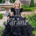 Glam black floor length multi-layer tulle skirt gown with white floral work elite bodice