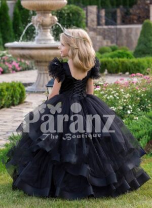Glam black floor length multi-layer tulle skirt gown with white floral work elite bodice back side view