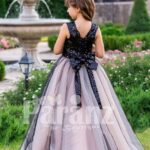 Glitz black sequin bodice baby gown with blue sheer pink tulle floor length skirt back side view