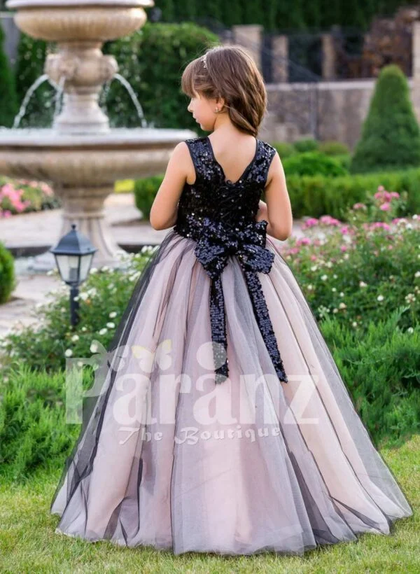 Glitz black sequin bodice baby gown with blue sheer pink tulle floor length skirt back side view