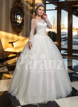 High volume tulle skirt wedding gown with full sleeve royal bodice in white