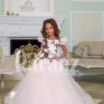 Light pink baby gown with flared and high volume tulle skirt and brown floral appliquéd bodice