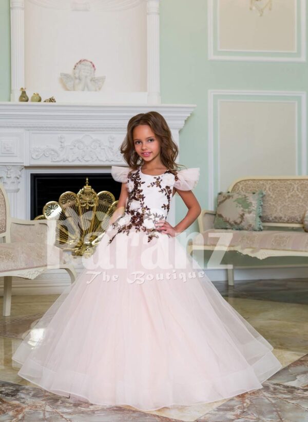 Light pink baby gown with flared and high volume tulle skirt and brown floral appliquéd bodice