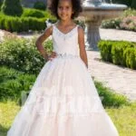 Light pink sleeveless baby party gown with rhinestone neckline and floor length tulle skirt