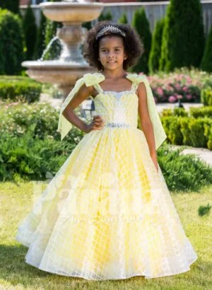 Light yellow sleeveless baby party gown with flared and floor length tulle skirt