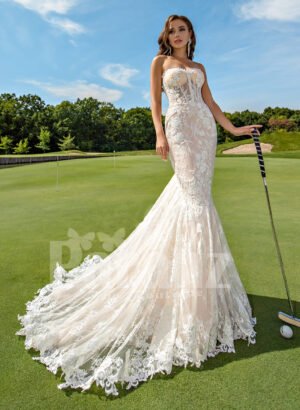 Mermaid style flared trail tulle wedding gown with rich lace work
