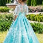Metallic sky blue rich satin floor length baby gown with glitz floral works all over Back side view