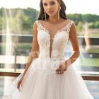 Multi-layer flared tulle skirt pearl white wedding gown with glam bodice close view