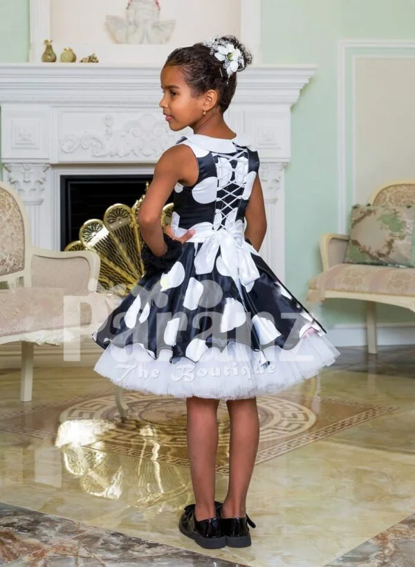 Navy blue tea length tulle skirt sleeveless party dress with white ball print all over back side view