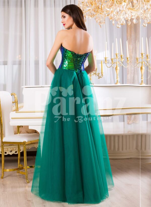 Peacock color off-shoulder bodice glam evening gown with long green tulle skirt back side view