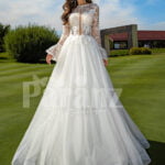 Pearl white elegant long and soft full sleeve wedding tulle gown