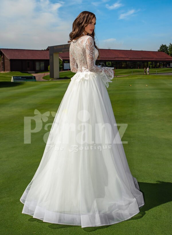 Pearl white elegant long and soft full sleeve wedding tulle gown back side view