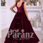Pigmented burgundy floor length velvet dress with big flower prints back side view